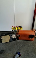 old vintage General Electric transistor radio and case 